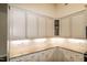 Bright kitchen with modern cabinets, subway tile backsplash, and granite countertops at 74 Revelstoke Dr, Garner, NC 27529