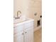 This laundry room features a white sink and cabinet with washer and dryer hookups at 74 Revelstoke Dr, Garner, NC 27529