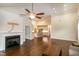 Open living room floor plan with high ceilings, fireplace, and hardwood floors at 74 Revelstoke Dr, Garner, NC 27529