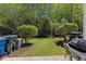 A cozy backyard with lush greenery, ideal for outdoor relaxation and entertaining at 7613 Satinwing Ln, Raleigh, NC 27617