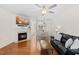 Inviting living room featuring a fireplace and hardwood floors at 7613 Satinwing Ln, Raleigh, NC 27617