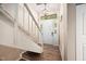 Welcoming entryway with a staircase and a front door with sidelights at 7707 Falcon Rest Cir, Raleigh, NC 27615