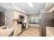 Bright kitchen with stainless steel appliances and a window seat with natural light at 7707 Falcon Rest Cir, Raleigh, NC 27615