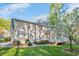 View of house exterior and yard from a side angle including the deck and yard at 8309 Nantahala Dr, Raleigh, NC 27612