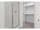 Bathroom featuring a glass shower and a walk-in closet at 837 Varina Ln, Fuquay Varina, NC 27526