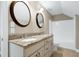 Bathroom with dual sinks, granite countertop, and bathtub at 837 Varina Ln, Fuquay Varina, NC 27526