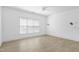 A bright and spacious bedroom featuring a ceiling fan and lots of natural light at 837 Varina Ln, Fuquay Varina, NC 27526