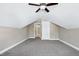 Attic bedroom featuring carpet and a door at 837 Varina Ln, Fuquay Varina, NC 27526