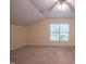 Bedroom featuring neutral carpet, ceiling fan, and a window at 906 Ingram Ct, Hillsborough, NC 27278