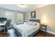Inviting bedroom featuring hardwood floors and great natural light at 9225 Palm Bay Cir, Raleigh, NC 27617