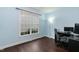 Bedroom featuring window and dark desk at 9225 Palm Bay Cir, Raleigh, NC 27617