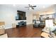 Comfortable living room featuring modern media center and open layout at 9225 Palm Bay Cir, Raleigh, NC 27617