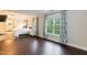 This main bedroom boasts hardwood floors, natural light and an ensuite bathroom at 9225 Palm Bay Cir, Raleigh, NC 27617