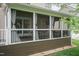 Exterior view of a sunroom addition, showcasing its seamless integration with the home's design at 9225 Palm Bay Cir, Raleigh, NC 27617