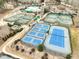 Overhead shot of community tennis and pickle ball courts and pool, showcasing recreational amenities at 9225 Palm Bay Cir, Raleigh, NC 27617