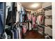 Spacious walk-in closet with shelving and clothing racks for ample storage at 9225 Palm Bay Cir, Raleigh, NC 27617