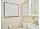 Stylish bathroom features modern fixtures and a decorative art piece at 1005 W Lenoir St, Raleigh, NC 27603