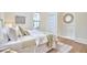 Bright bedroom with bed, decor and bright window at 1005 W Lenoir St, Raleigh, NC 27603