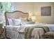 Comfortable bedroom featuring a plush bed and two side tables with lamps at 1005 W Lenoir St, Raleigh, NC 27603