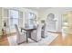 Charming dining room with hardwood floors, fireplace, and ample natural light at 1005 W Lenoir St, Raleigh, NC 27603