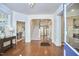 Elegant foyer with hardwood floors, showcasing a staircase and bright, welcoming space at 1005 W Lenoir St, Raleigh, NC 27603