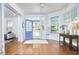 Bright foyer featuring hardwood floors, complemented by natural light and stylish decor at 1005 W Lenoir St, Raleigh, NC 27603