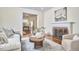 Inviting living room with fireplace, hardwood floors and neutral furniture at 1005 W Lenoir St, Raleigh, NC 27603