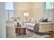 Comfortable living room with stylish furnishings, ample natural light, and a serene ambiance at 1005 W Lenoir St, Raleigh, NC 27603