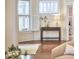Bright sitting area with window and table with white accents at 1005 W Lenoir St, Raleigh, NC 27603