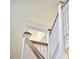 Elegant staircase with white railings and wood accents at 1005 W Lenoir St, Raleigh, NC 27603