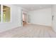 Bright bedroom with an open door and leafy views from the windows at 1011 Wood Sage Dr, Chapel Hill, NC 27516
