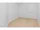 Bright bedroom with a wooden floor and a closet at 1011 Wood Sage Dr, Chapel Hill, NC 27516