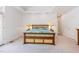 Spacious bedroom showcasing a handcrafted wooden bed frame and recessed lighting for a cozy ambiance at 1011 Wood Sage Dr, Chapel Hill, NC 27516