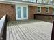 Wooden deck with access to the house and a view of the backyard at 1031 Jackson Royster Rd, Henderson, NC 27537