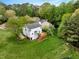 Well-maintained home featuring a spacious backyard and inviting wooden deck, perfect for outdoor gatherings at 104 Dilworth Ct, Cary, NC 27513