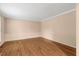 Bright bedroom with hardwood floors and neutral paint at 104 Dilworth Ct, Cary, NC 27513