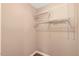 Walk-in closet with adjustable shelving system for efficient storage solutions at 104 Dilworth Ct, Cary, NC 27513