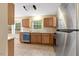 Contemporary kitchen featuring stainless steel appliances and ample cabinet space at 104 Dilworth Ct, Cary, NC 27513
