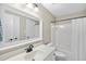 Bathroom with a large mirror reflecting the shower and vanity enhancing the bright and functional design at 109 Deer Valley Dr, Cary, NC 27519