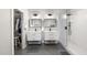 Modern bathroom showcasing double vanities, sleek mirrors, and a glass-enclosed shower for a luxurious feel at 109 Deer Valley Dr, Cary, NC 27519
