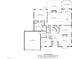 Detailed first-floor layout featuring living spaces, kitchen, primary bedroom, and garage at 109 Deer Valley Dr, Cary, NC 27519