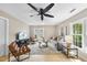 Inviting living room with comfortable seating, natural light, and stylish decor for relaxation and entertainment at 109 Deer Valley Dr, Cary, NC 27519