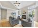 Bright living room with vaulted ceilings, fireplace, and large windows at 109 Deer Valley Dr, Cary, NC 27519