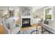 Inviting living room with a fireplace and comfortable seating arrangement, perfect for relaxation and gatherings at 109 Deer Valley Dr, Cary, NC 27519