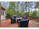 Spacious outdoor deck with comfortable seating around a fire pit, perfect for enjoying the outdoors at 109 Deer Valley Dr, Cary, NC 27519
