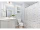 Bathroom featuring a vanity, toilet, and shower with a decorative floral curtain at 1101 Sky Wave Trl, Raleigh, NC 27603