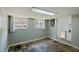 Finished basement with slate tile flooring, windows and exterior access at 1105 Englewood Ave, Durham, NC 27701