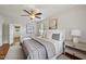 Relaxing bedroom featuring calming colors, a ceiling fan, and natural light from the window at 1105 Englewood Ave, Durham, NC 27701