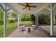 Outdoor covered patio features brick flooring and a ceiling fan at 1105 Englewood Ave, Durham, NC 27701