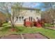 Multi-level deck and spacious backyard, ideal for outdoor activities and enjoying nature at 1127 Woodlands Creek Way, Apex, NC 27502